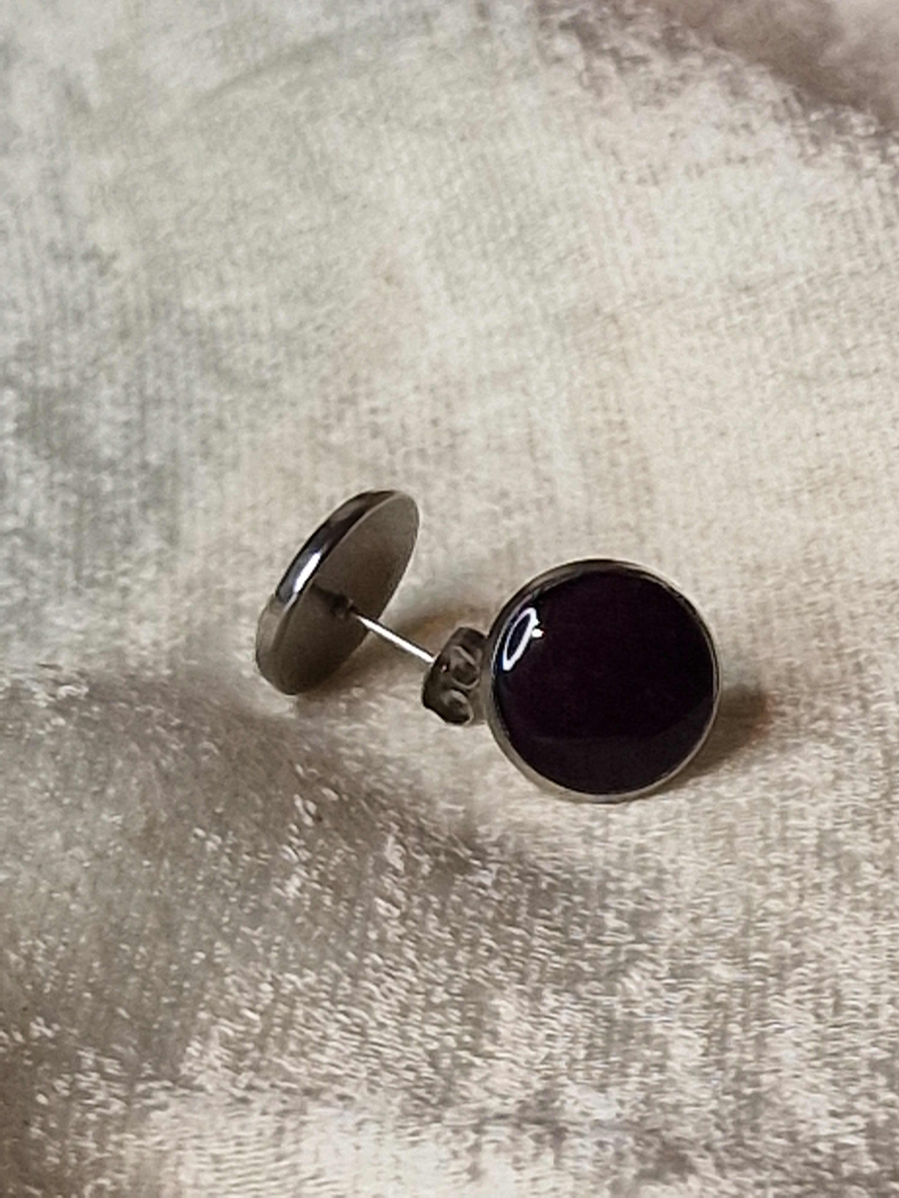 Pendientes de rosa roja.
